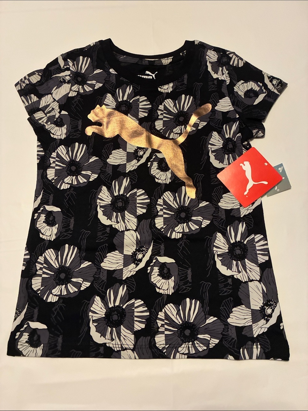Puma Black Floral Short Sleeve Tee with Gold Logo